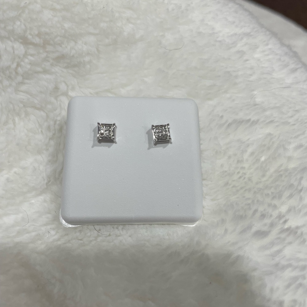 Brand new diamond earring studs.